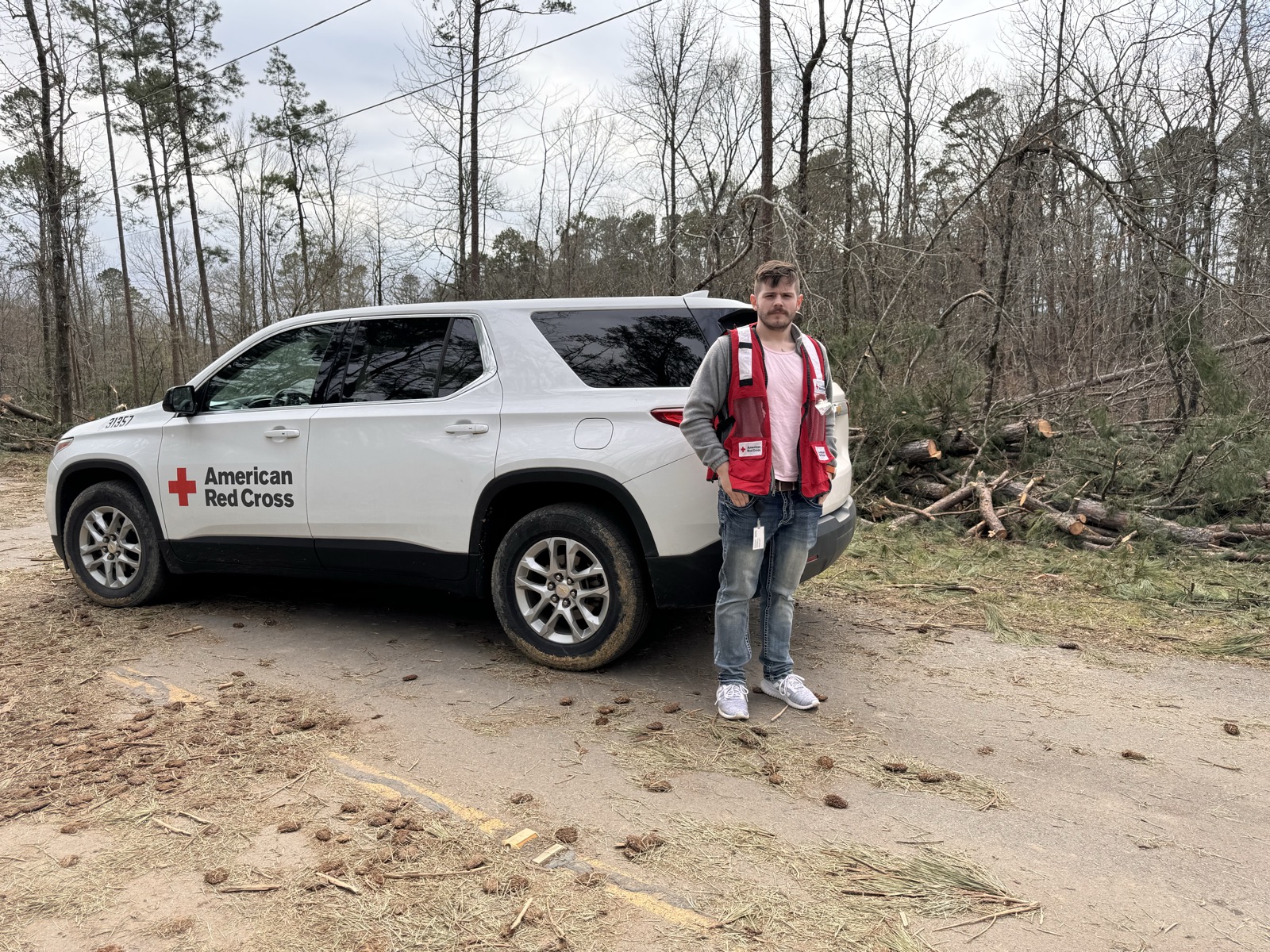 Damage assessment next to Red Cross vehicle in Arkansas